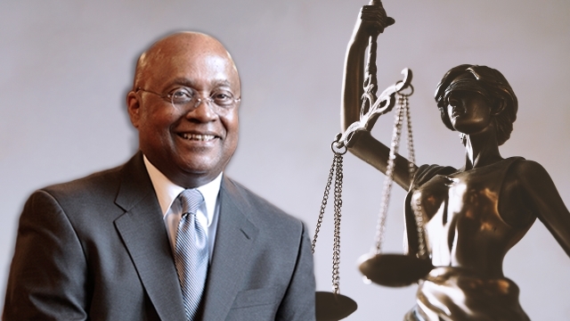 Hon. Theodore T. Jones, Jr. ’72, ’07HON and Scales of Justice