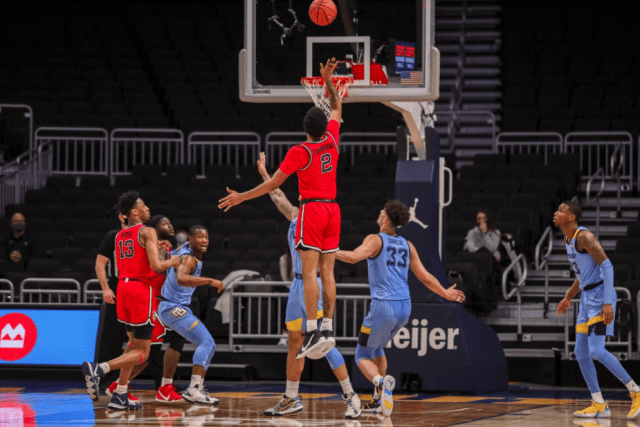 SJU Marquette game #2 goes up for a shot