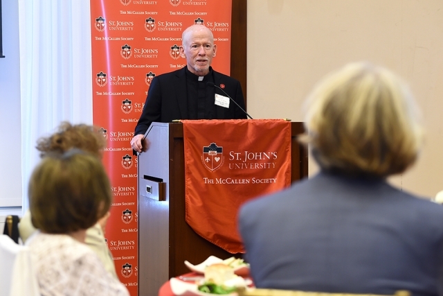 Fr. Shanley speaking at podium at 2021 McCallen Society Luncheon