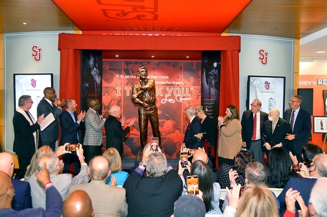 Statue being unveiled inside Carnesecca Arena 