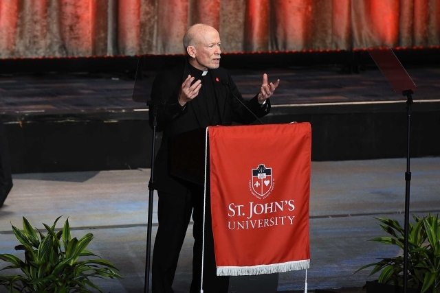 President Shanley speaking at podium