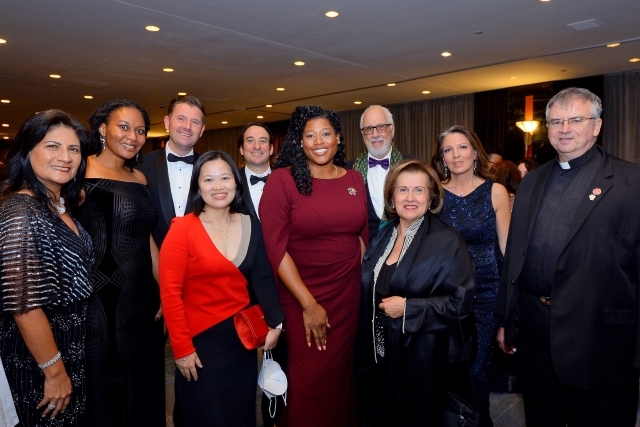 Group shot of adults posing for photo