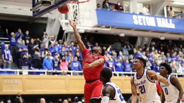 St. John's basketball player making a layup against Seton Hall 