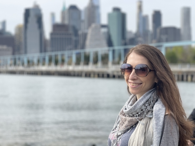 Marina Sorochinski, Ph.D. by the NYC skyline