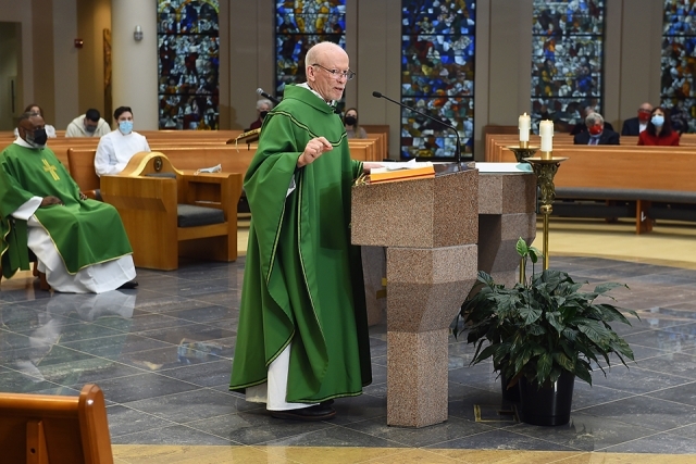 Fr. Shanley speaking during Mass