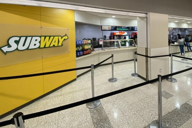 Subway restaurant with line barriers