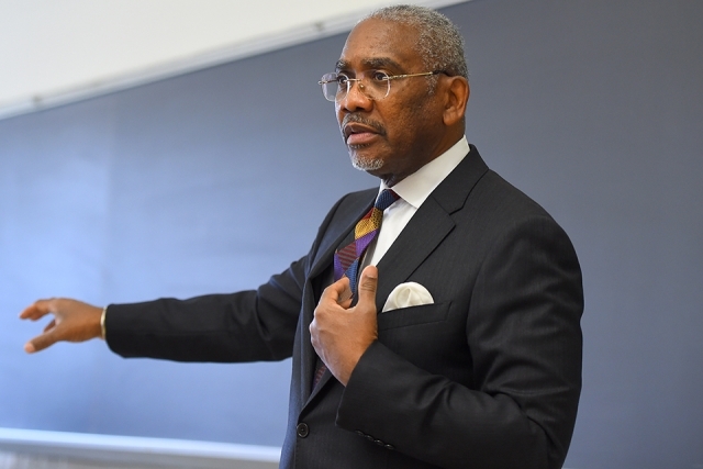Rep. Greg Meeks speaking infront of classroom