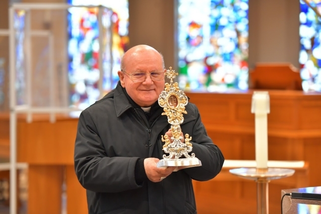 The Most Rev. Archbishop Domenico Sorrentino of the Diocese of Assisi-Nocera Umbra-Gualdo Tadino in Italy with the relic of Blessed Carlo Acutis