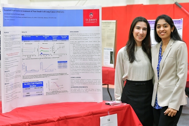 Two students presenting at Student Research Conference