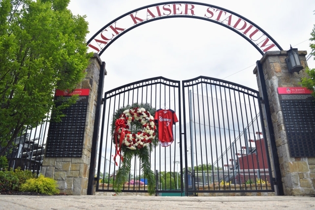 Jersey and sympathy flowers on Kaiser Stadium gate