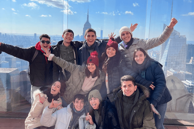 Friends of Fulbright Argentina students pose for a photo at the Top of the Rock exhibit in Manhattan