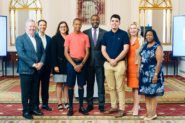 Kallan Richardson and Miguel Simas with representatives of the Association or Bermuda Insurers and Reinsurers and Bermuda College at the scholarship awards ceremony.