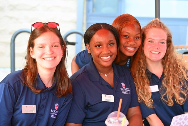 Residence life staff pose for a photo