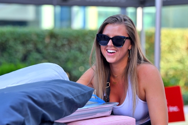 St. John's student with her stuff at move in day