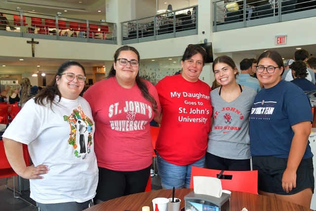 Student and family members in dining court