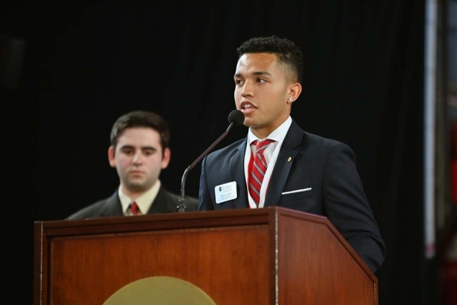 Student speaking at podium at 2022 New Student Convocation