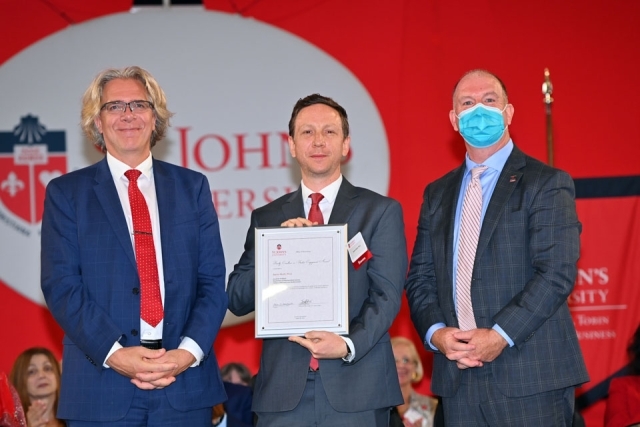 University employees pose for a photo