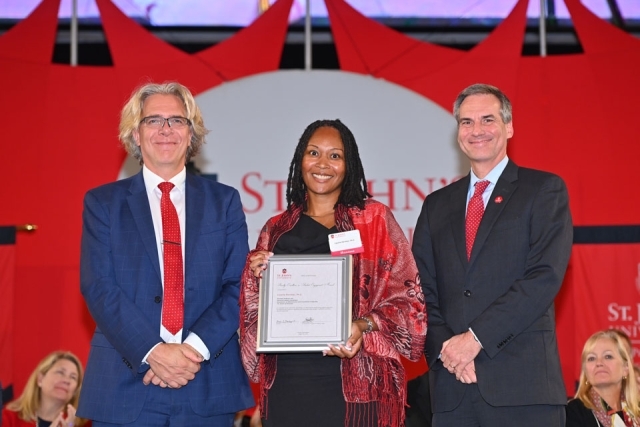 University employees pose for a photo