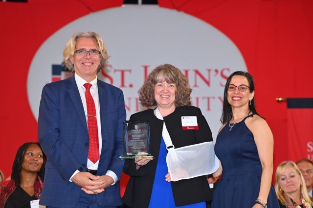 University employees pose for a photo