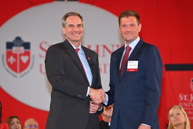 University employees pose for a photo