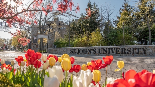 Gate 1 at St. John's with some tulips