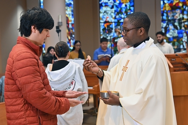 Person receiving the Eucharist
