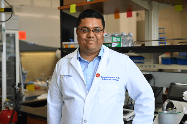 Saurabh Agarwal, Ph.D. poses for a picture in the lab