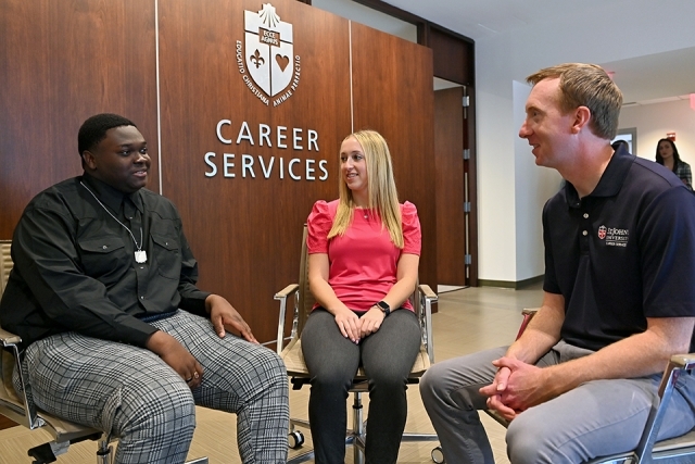students talking at the career center