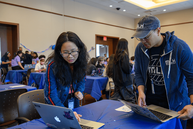 Students working together at Hackathon