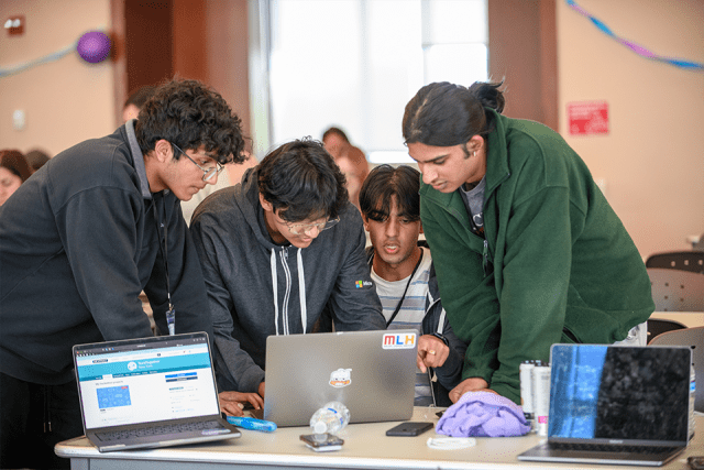 Students working together at Hackathon