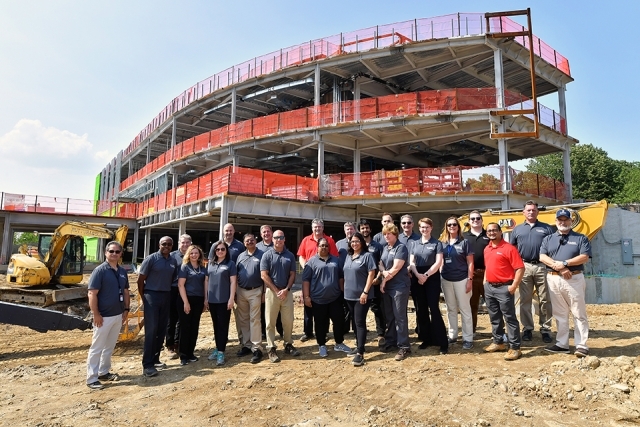 St. John's facilities team in front of St. Vincent Health Sciences Center