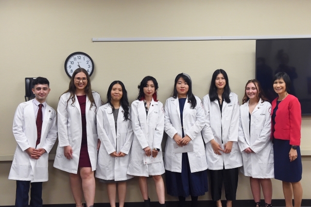 Laboratory Sciences students pose for a group photo at the white coat ceremony