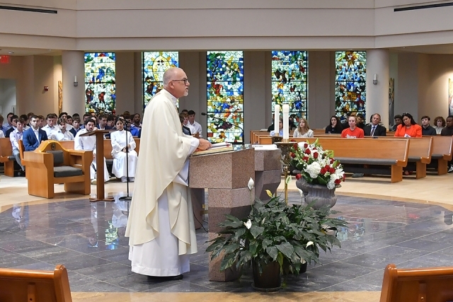 Fr Rooney speaks at Mass in St. Thomas More Church 