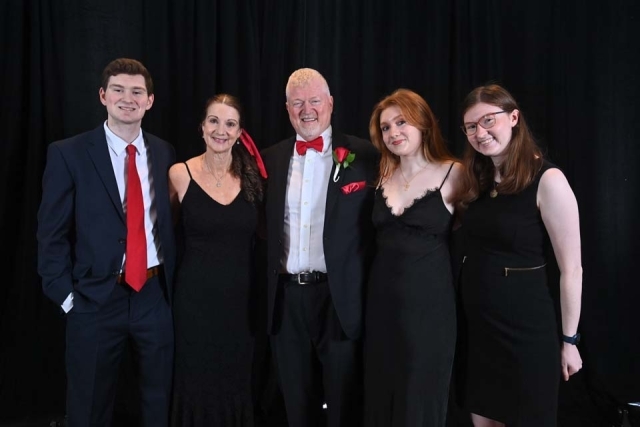 A group of people dressed up at St. John's President's Dinner