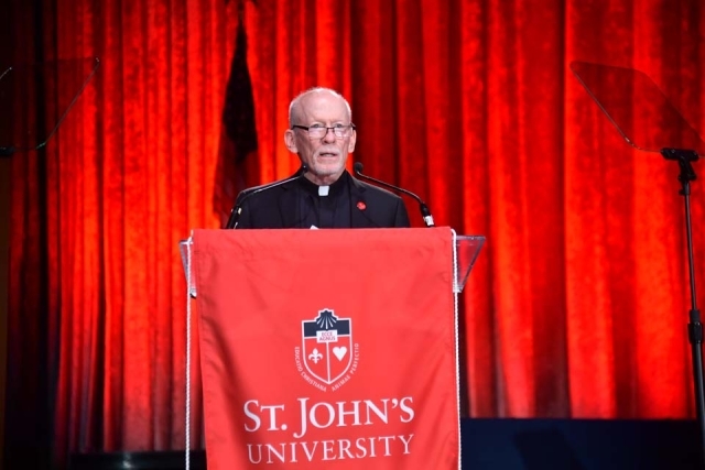 President Shanley at podium speaking during the St. John's University President's Dinner