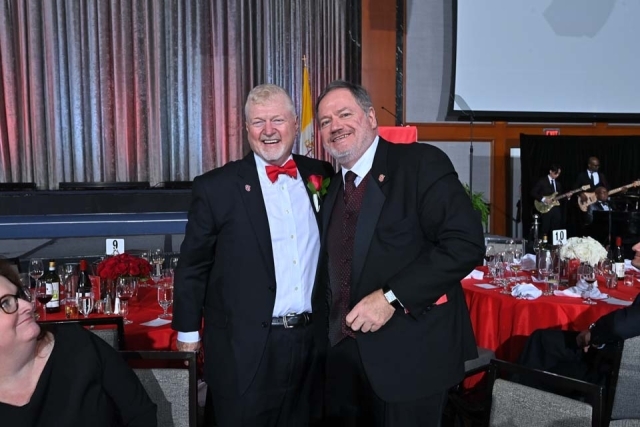 Two men posing for photo at the 2024 St. John's Presidents Dinner 