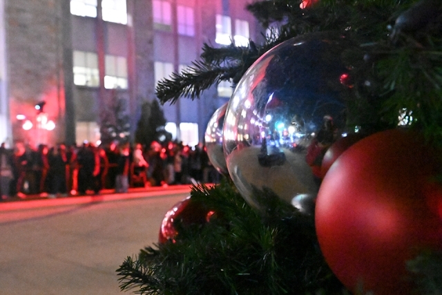 The Christmas tree with ornaments on the great lawn at St. John's University 