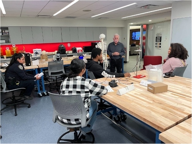 professor_karl_hoffman_with_the_explorers_during_one_of_his_presentations_about_crime_scene_investigation