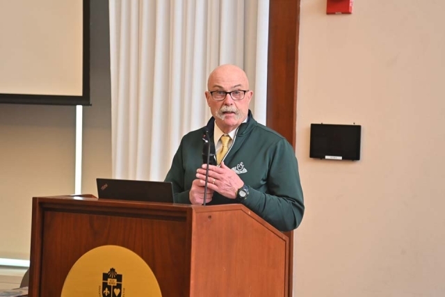 Man speaking at podium