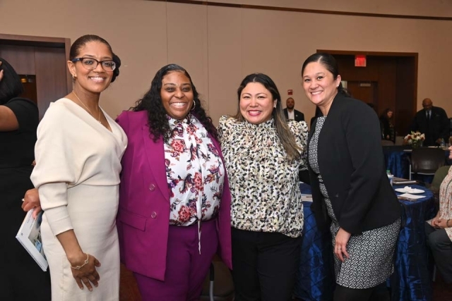 Four St. John's women pose for a photo