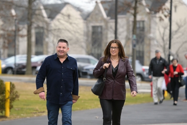 Couple walking on campus