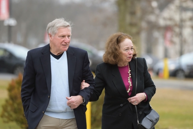 Couple walking on campus