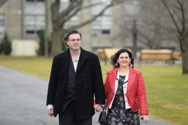 Couple walking on campus