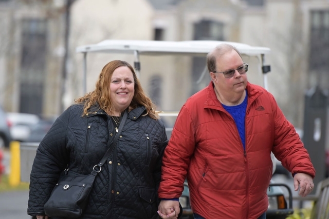 Couple walking on campus