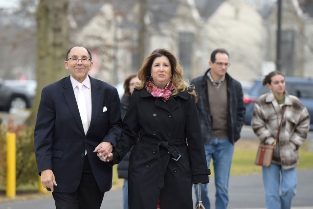 Couple walking on campus