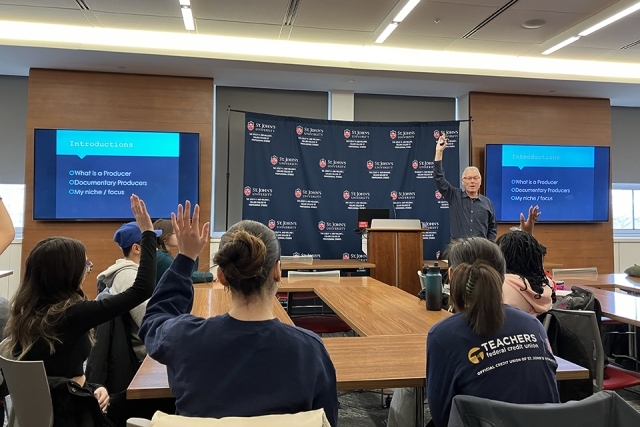 Students watching a presentation