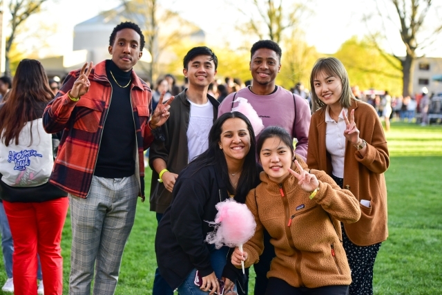 St. john's student socializing during a spring event on campus  