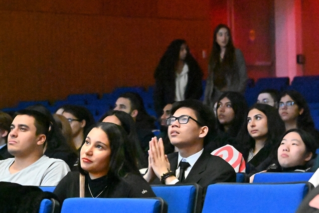 Documentary viewers in their seats at the theater