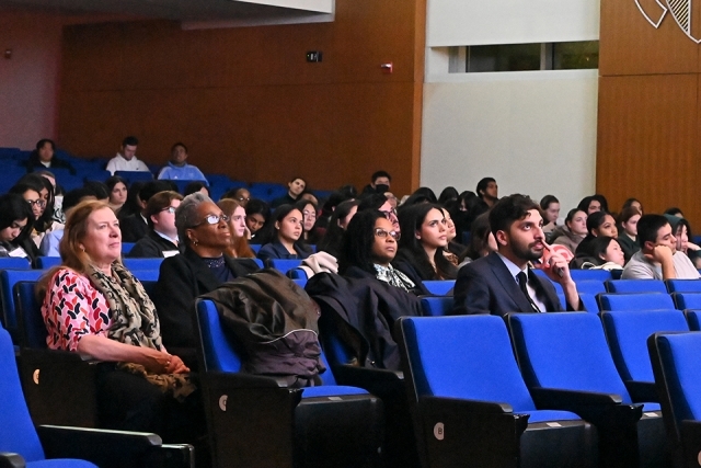 Documentary viewers in their seats at the theater