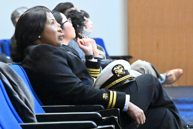 Documentary viewers in their seats at the theater